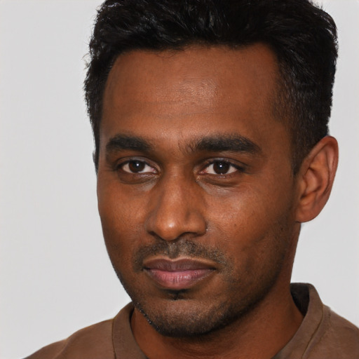 Neutral black young-adult male with short  black hair and brown eyes