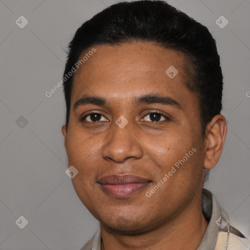 Joyful black young-adult male with short  black hair and brown eyes