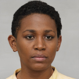 Neutral black young-adult female with short  brown hair and brown eyes