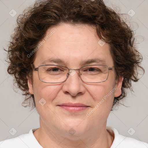 Joyful white adult female with short  brown hair and brown eyes