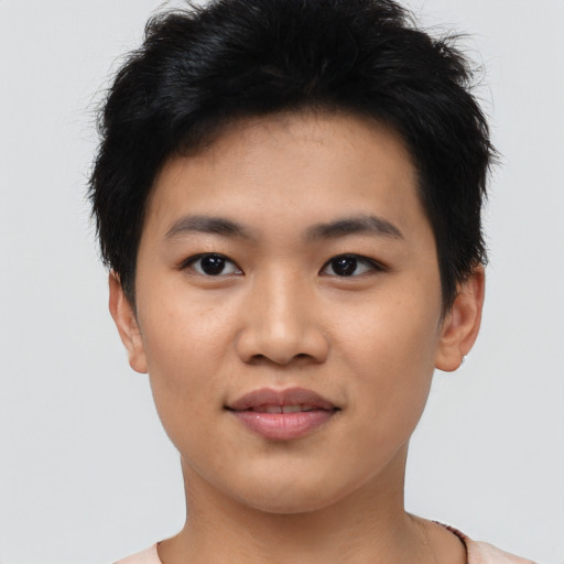 Joyful asian young-adult male with short  black hair and brown eyes