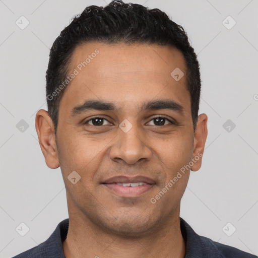 Joyful latino young-adult male with short  black hair and brown eyes