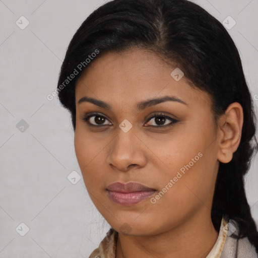 Joyful latino young-adult female with long  brown hair and brown eyes