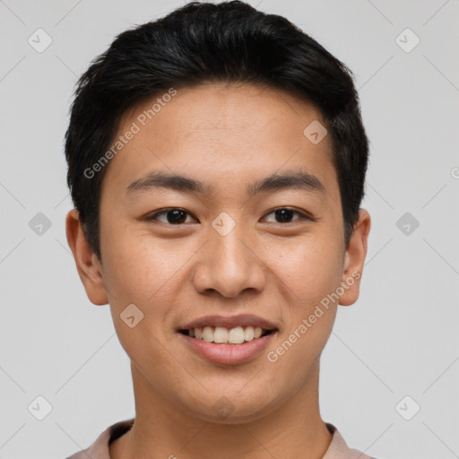 Joyful asian young-adult male with short  brown hair and brown eyes