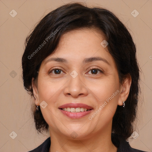 Joyful white adult female with medium  brown hair and brown eyes