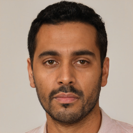 Neutral latino young-adult male with short  black hair and brown eyes