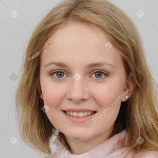 Joyful white young-adult female with medium  brown hair and blue eyes