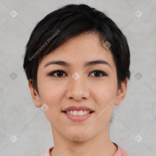 Joyful asian young-adult female with short  black hair and brown eyes