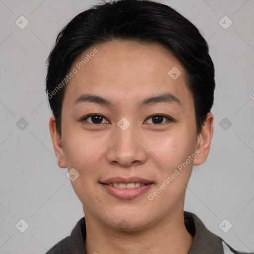 Joyful asian young-adult female with short  black hair and brown eyes