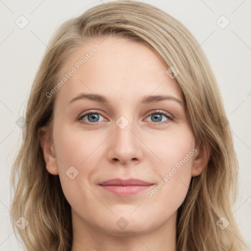 Joyful white young-adult female with long  brown hair and blue eyes