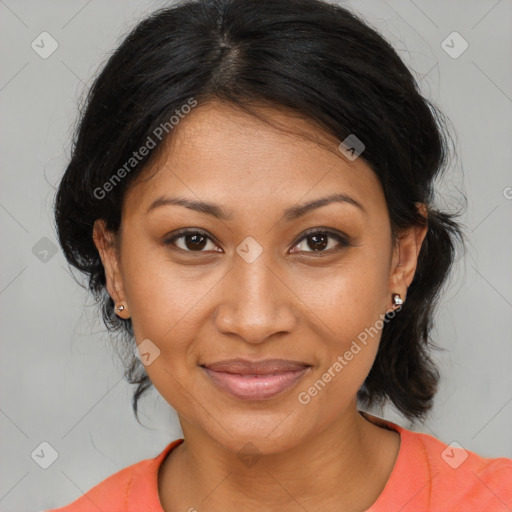 Joyful black young-adult female with medium  brown hair and brown eyes