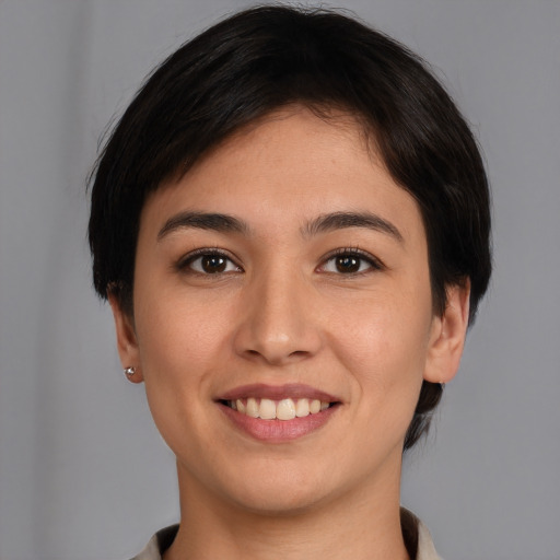 Joyful white young-adult female with medium  brown hair and brown eyes