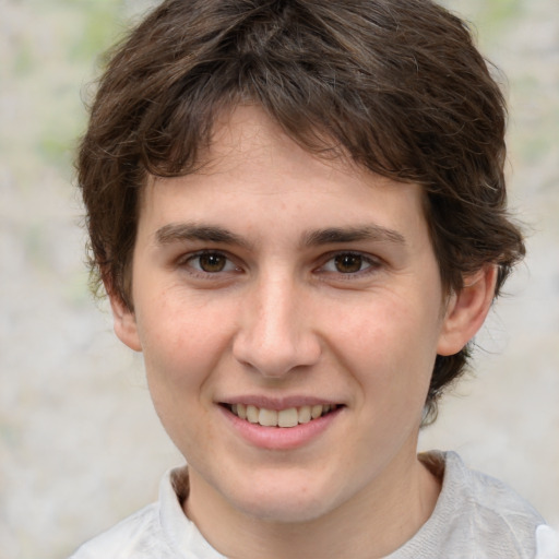 Joyful white young-adult male with medium  brown hair and brown eyes