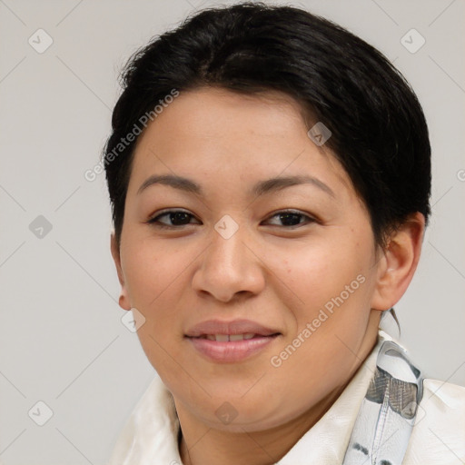 Joyful asian young-adult female with short  brown hair and brown eyes