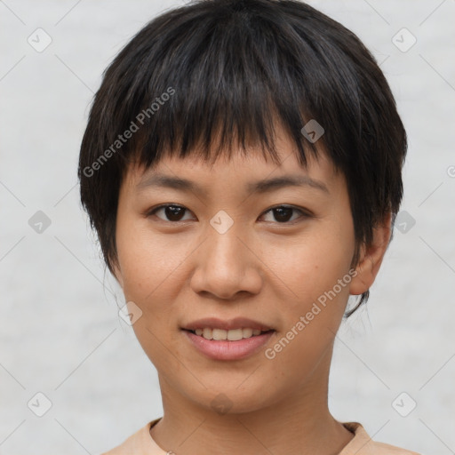 Joyful asian young-adult female with short  brown hair and brown eyes