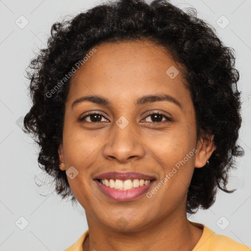 Joyful latino adult female with short  brown hair and brown eyes