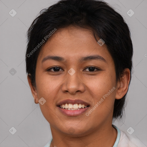 Joyful asian young-adult female with short  brown hair and brown eyes