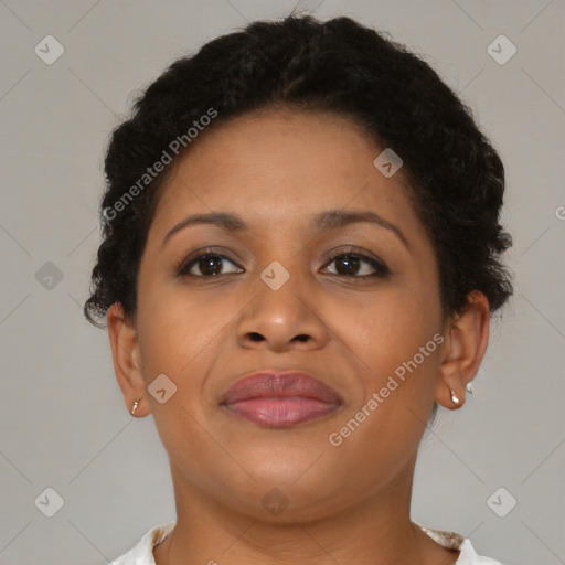 Joyful black young-adult female with short  brown hair and brown eyes