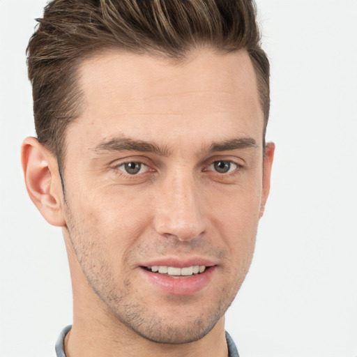 Joyful white young-adult male with short  brown hair and brown eyes