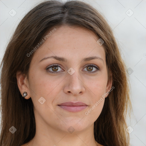 Joyful white young-adult female with long  brown hair and green eyes