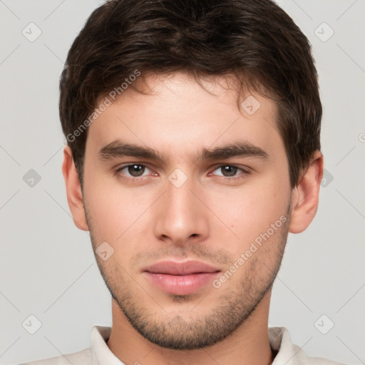 Neutral white young-adult male with short  brown hair and brown eyes