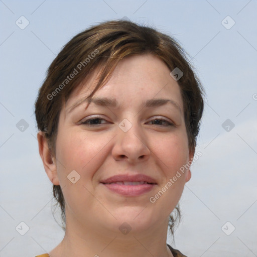 Joyful white adult female with medium  brown hair and brown eyes