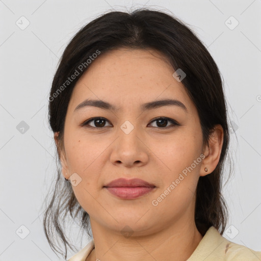 Joyful asian young-adult female with medium  brown hair and brown eyes