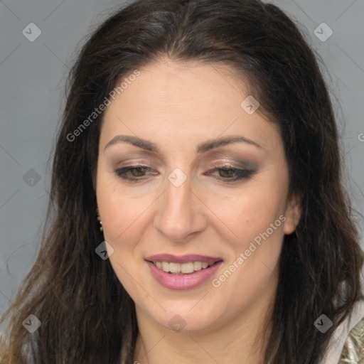 Joyful white adult female with long  brown hair and brown eyes