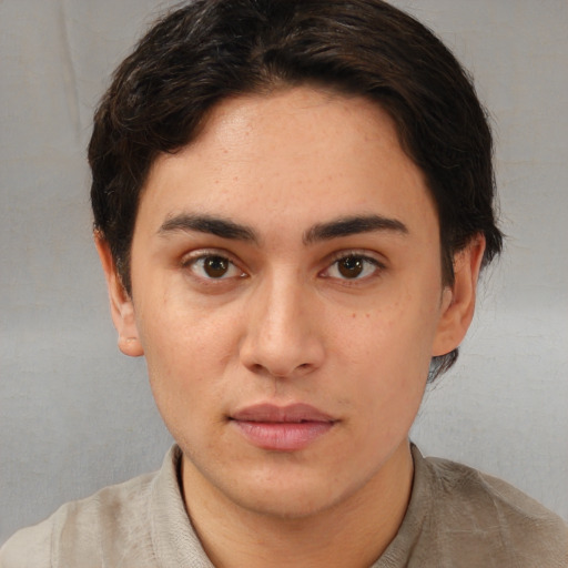 Neutral white young-adult female with short  brown hair and brown eyes