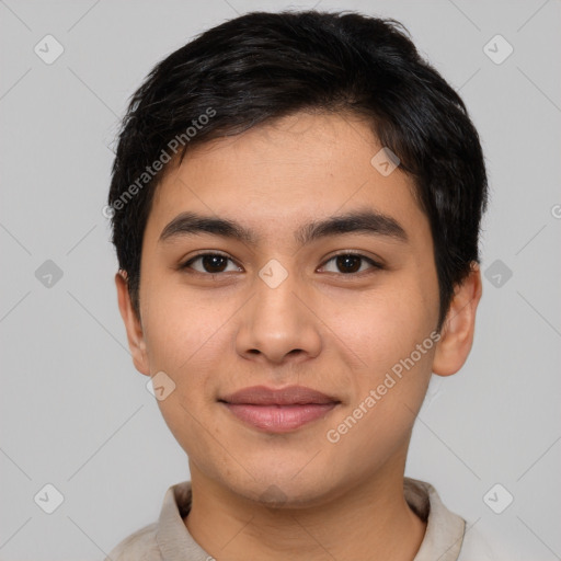 Joyful asian young-adult male with short  brown hair and brown eyes