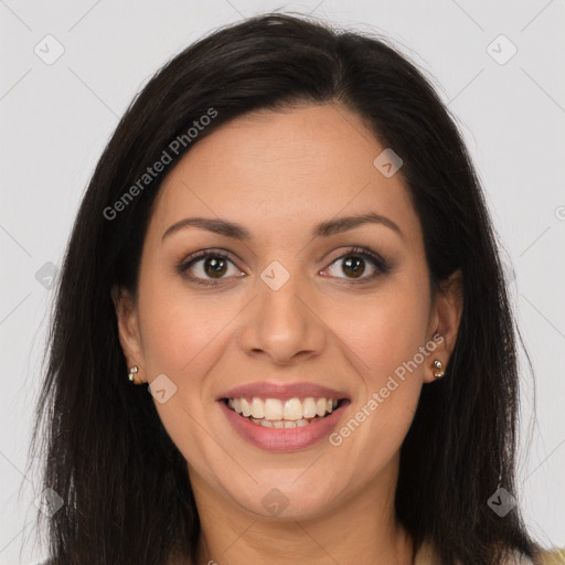 Joyful latino young-adult female with long  brown hair and brown eyes