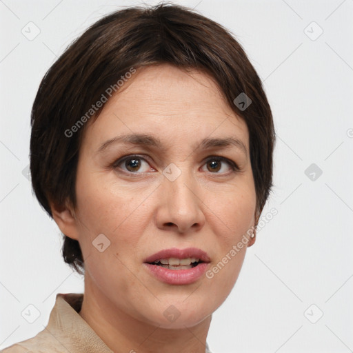 Joyful white adult female with short  brown hair and brown eyes