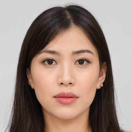 Neutral asian young-adult female with long  brown hair and brown eyes