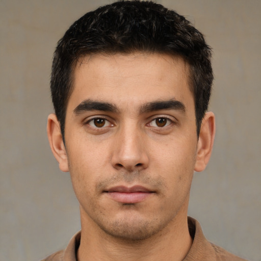 Neutral white young-adult male with short  black hair and brown eyes