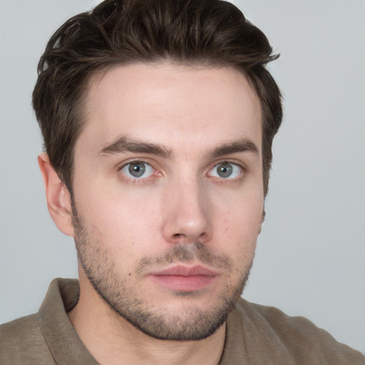 Neutral white young-adult male with short  brown hair and grey eyes