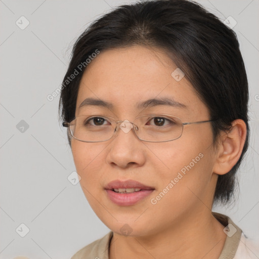 Joyful white adult female with medium  brown hair and brown eyes