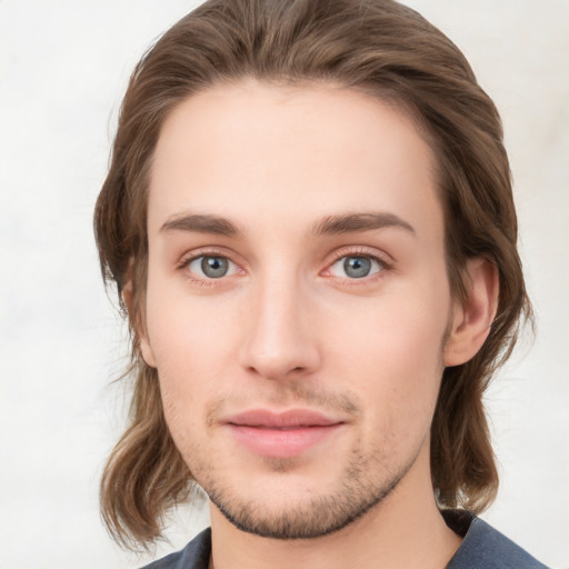 Neutral white young-adult male with medium  brown hair and grey eyes