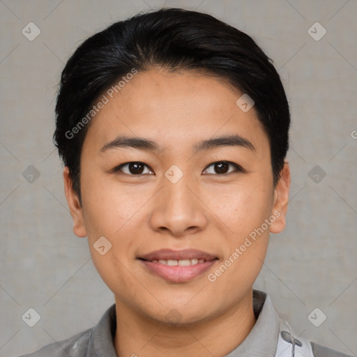 Joyful asian young-adult female with short  black hair and brown eyes