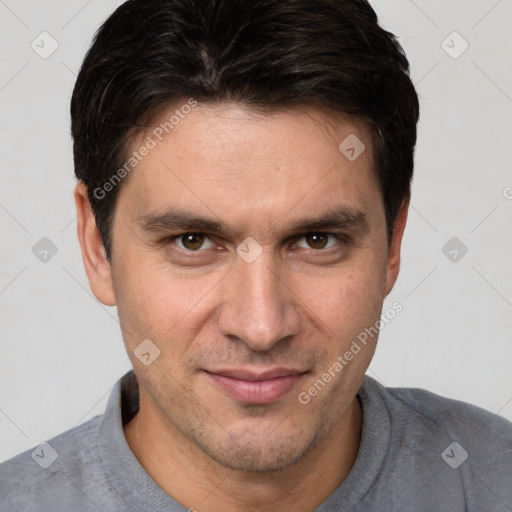 Joyful white young-adult male with short  brown hair and brown eyes