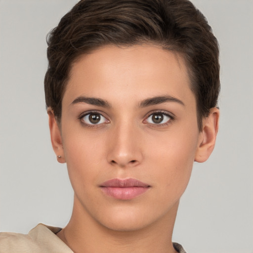 Neutral white young-adult female with short  brown hair and brown eyes