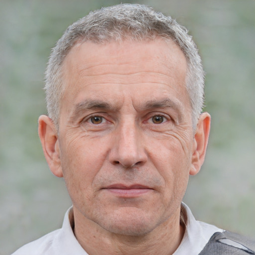 Neutral white middle-aged male with short  gray hair and brown eyes