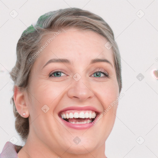 Joyful white young-adult female with medium  brown hair and blue eyes