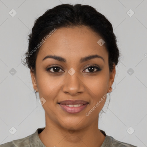 Joyful latino young-adult female with short  brown hair and brown eyes