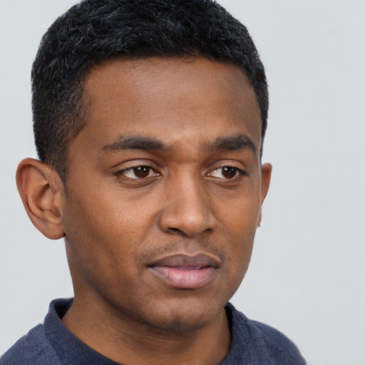 Neutral latino young-adult male with short  brown hair and brown eyes