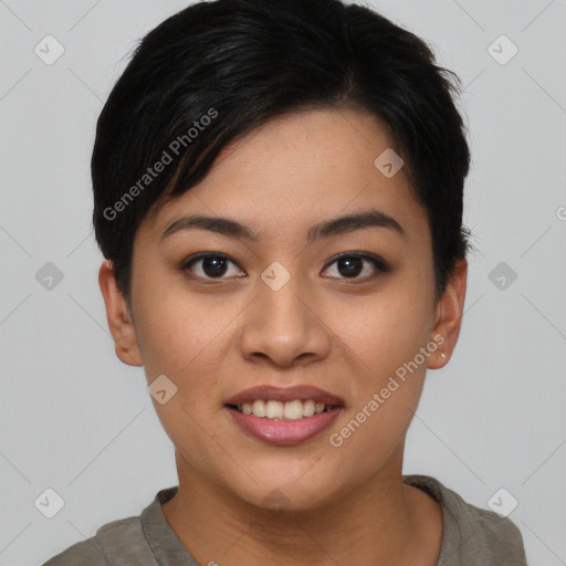 Joyful asian young-adult female with short  black hair and brown eyes