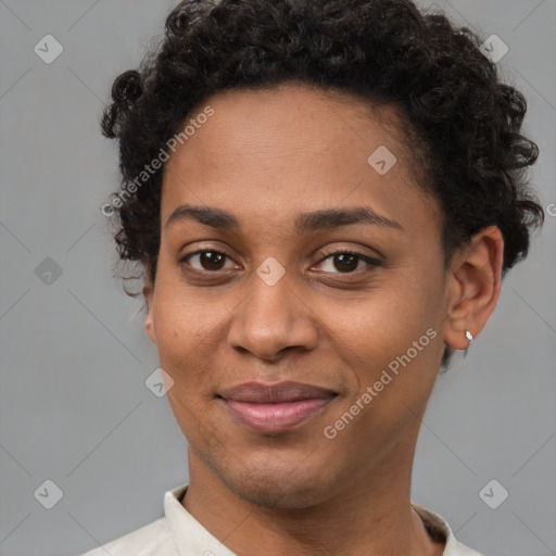 Joyful black young-adult female with short  brown hair and brown eyes