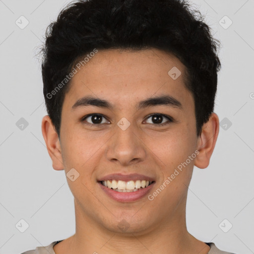 Joyful latino young-adult male with short  brown hair and brown eyes