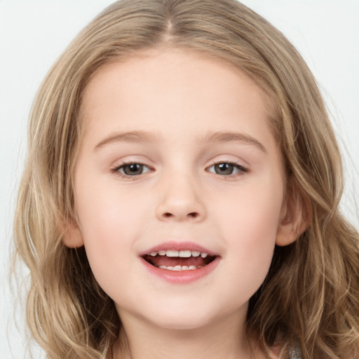 Joyful white child female with long  brown hair and brown eyes