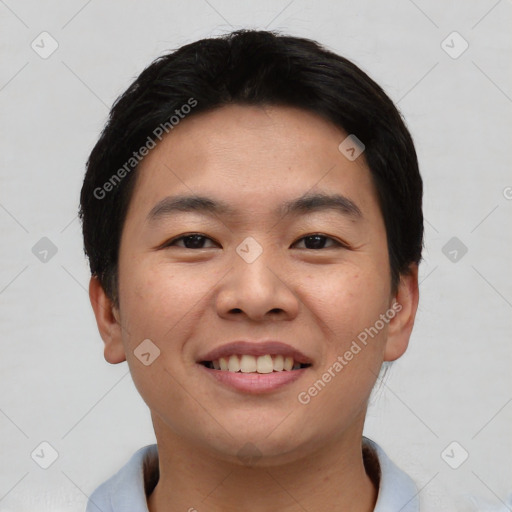 Joyful asian young-adult male with short  black hair and brown eyes