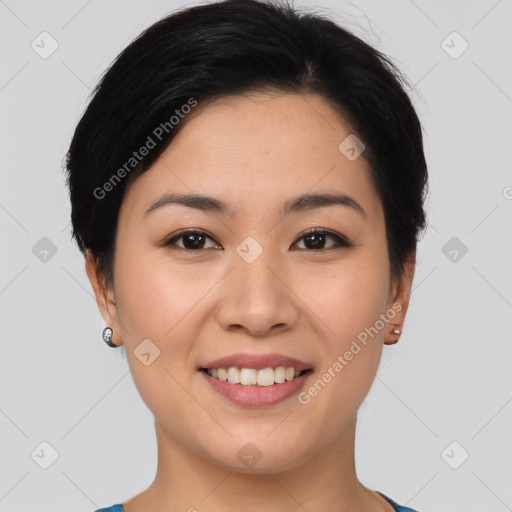 Joyful asian young-adult female with short  brown hair and brown eyes